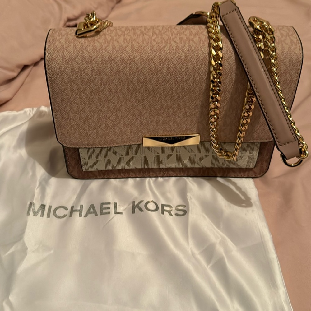 Michael Kors rose gold shoulder/crossbody bag.
